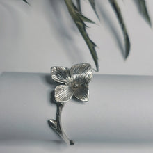 Load image into Gallery viewer, closer shot of adjustable ring white background and dried leaves in background