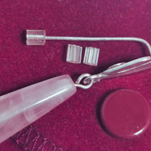 Load image into Gallery viewer, silicone earrings stoppers placed   on ear post with burgundy background