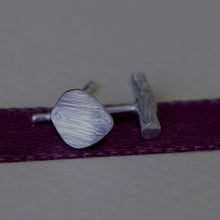 Load image into Gallery viewer, Mismatched stud earrings, silver twig and tiny leaf