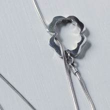 Load image into Gallery viewer, Lariat necklace, silver flower clasp in front