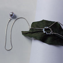 Load image into Gallery viewer, Lariat necklace, silver flower clasp in front
