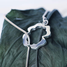Load image into Gallery viewer, Lariat necklace, silver flower clasp in front