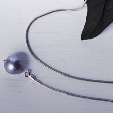 Load image into Gallery viewer, Lariat necklace, silver flower clasp in front