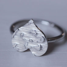 Load image into Gallery viewer, Close up shot of top of silver heart shape ring, engraved heart ring for anniversary, white background
