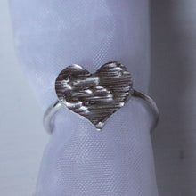 Load image into Gallery viewer, Silver heart shape ring, engraved heart ring for anniversary, slid on an organza pouch, white background