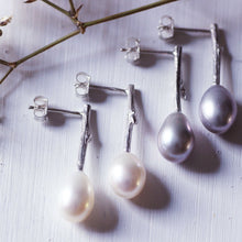 Load image into Gallery viewer, Pearl_drop_earrings-oval_white and grey _pearls on white wood background