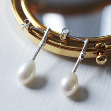 Load image into Gallery viewer, Pearl drop earrings-oval white pearls placer on a gold framed mirror