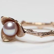 Load image into Gallery viewer, Rose gold ring, Flower pearl ring, pink pearl, twig design, close-up shot on flower, white background