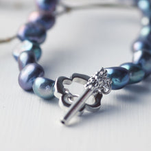 Load image into Gallery viewer, knotted blue shades of violet pearl bracelet closer shot clasp on white back ground