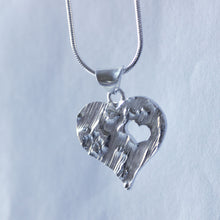 Load image into Gallery viewer, Large textured heart pendant with a cut-out little heart