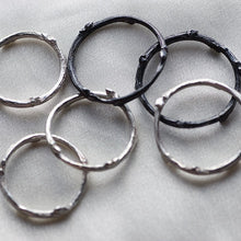 Load image into Gallery viewer, Stack rings, twig, silver or black rhodium - 4 silver rings and 2 plated black rhodium on white background