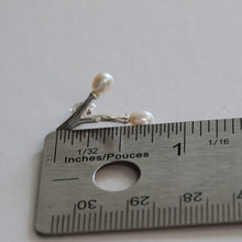 Load image into Gallery viewer, Freshwater pearl earrings, wishbone design twig earrings, one side placed near a ruler, white background