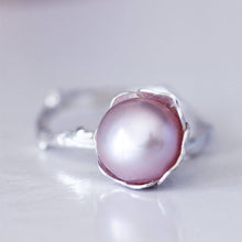 Load image into Gallery viewer, Pink pearl charm ring, sterling silver flower, closer-up shot of the pearl, placed on a white background