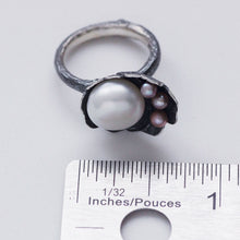 Load image into Gallery viewer, Cocktail ring, black silver, flower and twig designs on white background, top placed near a ruler for dimension