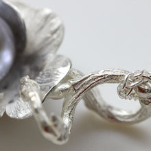 Load image into Gallery viewer, Silver flower pendant, macro pic of the twig loop
