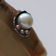 Load image into Gallery viewer, Cocktail ring, black silver, flower and twig designs weared, top view