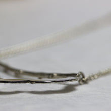 Load image into Gallery viewer, Flower pendant, necklace for women, oval stone set, face down on white background, profile sight