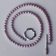 Load image into Gallery viewer, Flower clasp necklace, pink pearls, rolled on itself