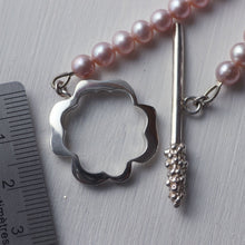 Load image into Gallery viewer, Flower necklace, flower clasp placed near a ruler