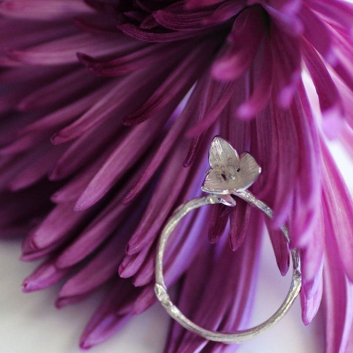 Flower adjustable ring for women on a pink Gerbera daisy