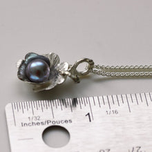 Load image into Gallery viewer, Silver flower pendant, grey pearl, placed near a ruler
