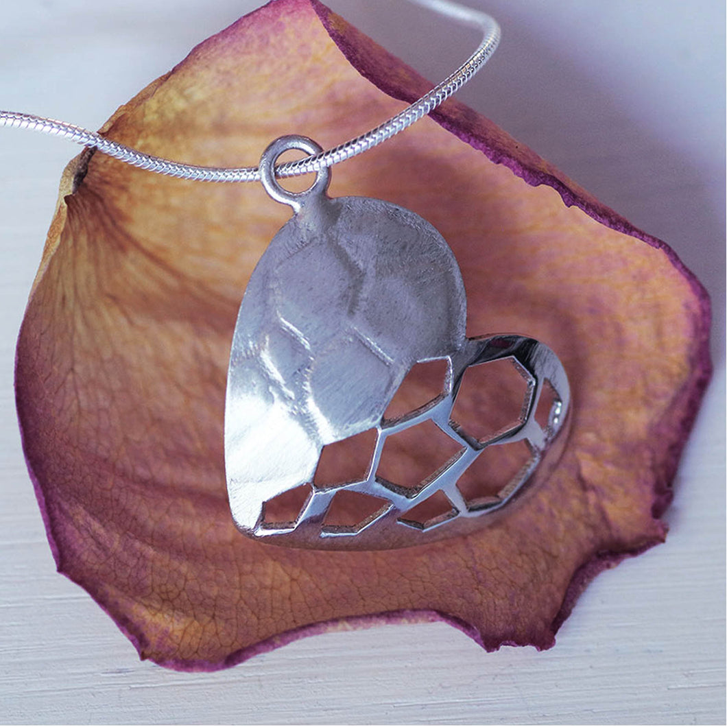 Minimalist engraved heart pendant in sterling silver