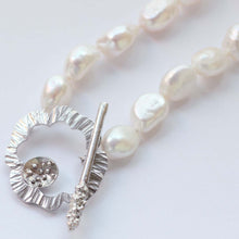 Load image into Gallery viewer, Knotted pearl pendant necklace, silver flower clasp
