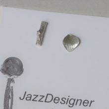 Load image into Gallery viewer, Mismatched stud earrings, silver twig and tiny leaf
