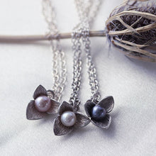 Load image into Gallery viewer, Sterling silver flower necklace, trillium pendant set with a pearl
