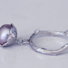 Load image into Gallery viewer, Pink pearl charm ring, sterling silver flower, profile shot, placed on a white background
