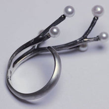 Load image into Gallery viewer, Adjustable ring, silver cocktail ring, twig design covering fingers, side view on white background
