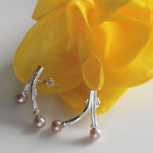 Load image into Gallery viewer, Freshwater pearl earrings, wishbone design twig earrings, pink pearls, yellow flower in the back

