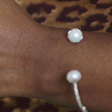 Load image into Gallery viewer, Twig silver cuff bracelet set with with pearls on wrist
